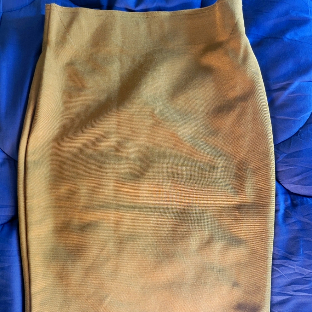 Couture Wow pencil skirt. Tight slim skirt. Shiny material on skirt. Very tight
